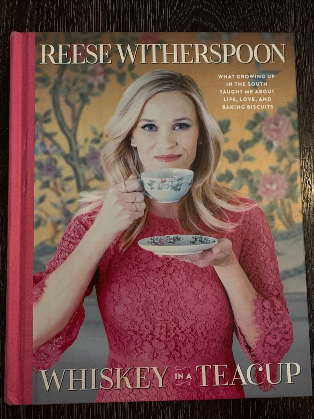 Reese Witherspoon whiskey in a tea cup
